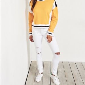 White Hollister high-waisted skinny ripped jeans